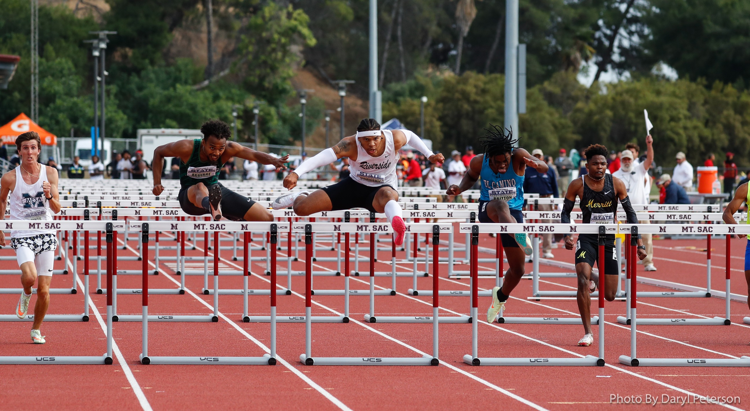 Joshua Hornsby clears the hurdle middle as he wins the 110-meter hurdles state title on Saturday (photo by Daryl Peterson, for CCCAA).